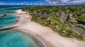 Aerial architectural photography – doors‑off helicopter view of Kapilina Beach Homes master‑planned community