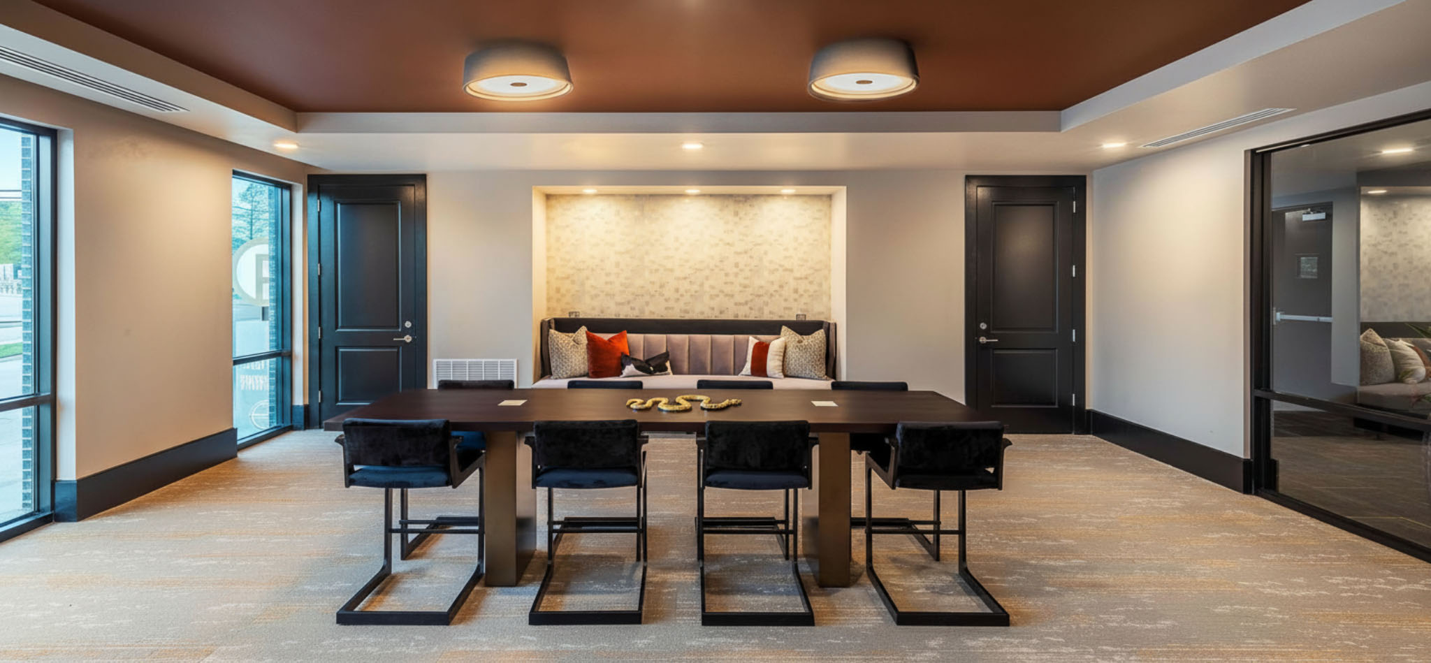 Architectural interior of a modern amenity lounge within a mission‑critical or data‑center facility.